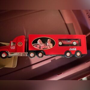 NIB year 1999 electronic Coca-Cola Christmas truck with a mini 53 Corvette